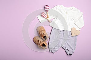 Flat lay composition with child`s clothes on background, space for text