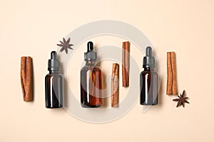 Flat lay composition with cinnamon essential oil