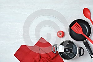 Flat lay composition with clean cookware and space for text