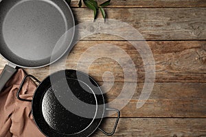 Flat lay composition with clean cookware and space for text