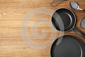 Flat lay composition with clean cookware and space for text