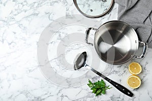 Flat lay composition of clean kitchenware on marble background