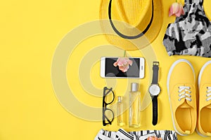 Flat lay composition with clothes and accessories on color background, space for text.