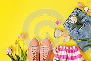 Flat lay composition with clothes and accessories on color background. Trendy spring look