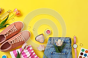 Flat lay composition with clothes and accessories on color background. Trendy spring look