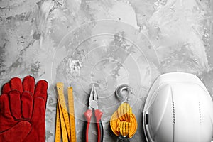Flat lay composition with construction tools, space for text