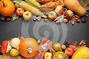 Flat lay composition with cutlery, autumn vegetables and fruits on grey background. Happy Thanksgiving day