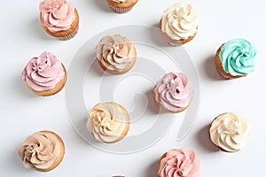 Flat lay composition with delicious birthday cupcakes