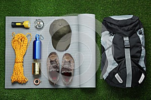 Flat lay composition with different camping equipment