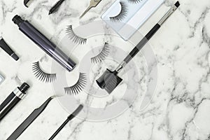 Flat lay composition with false eyelashes