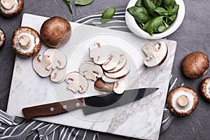 Flat lay composition with fresh raw mushrooms