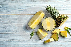 Flat lay composition with fresh sliced pineapple