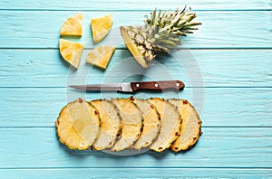 Flat lay composition with fresh sliced pineapple