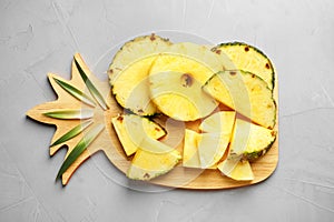 Flat lay composition with fresh sliced pineapple