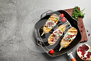 Flat lay composition with grill pan of fried eggplants