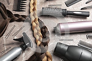 Flat lay composition with hair salon tools