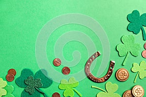Flat lay composition with horseshoe on background, space for text. St. Patrick`s Day celebration