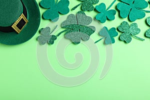 Flat lay composition with leprechaun hat on background, space for text. St. Patrick`s Day celebration