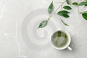 Flat lay composition with matcha tea and leaves