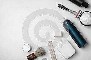Flat lay composition with men`s shaving accessories and space for text