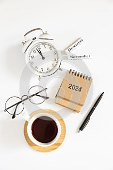 Flat lay composition office table with 2024 calendar