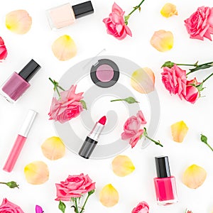 Flat lay composition with orange roses flowers and cosmetics on white background.Top view