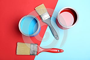 Flat lay composition with paint cans and brushes