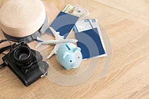 Flat lay composition with passport, toy plane and tickets on white wooden background, space for text. Visa receiving.