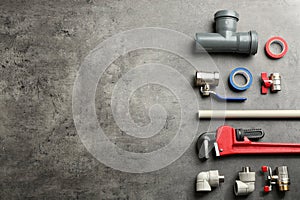Flat lay composition with plumber`s tools and space for text
