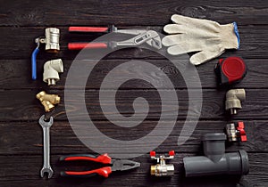 Flat lay composition with plumber`s tools and space for text