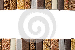 Flat lay composition with protein bars on white background.