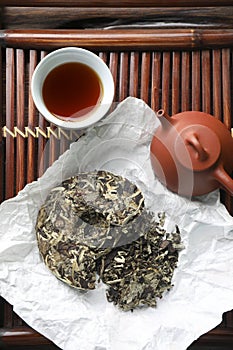 Flat lay composition with pu-erh tea on wooden tray. Traditional ceremony