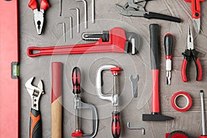 Flat lay  with repair tools on grey stone table