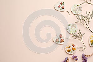 Flat lay composition with scented sachets on beige background, space for text