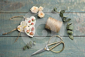 Flat lay composition with scented sachets on blue wooden table