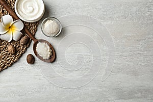 Flat lay composition with Shea butter, nuts on light background