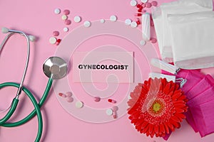 Flat lay composition with stethoscope, period supplies