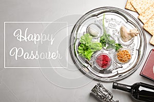 Flat lay composition with symbolic Passover Pesach items on color background
