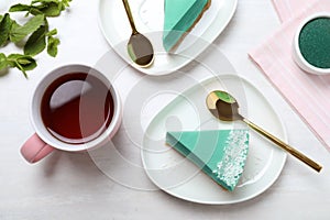 Flat lay composition with tasty spirulina cheesecake