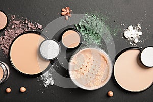 Flat lay composition with various makeup face powders