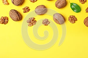 Flat lay composition with walnuts and space for text