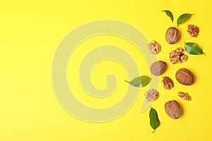 Flat lay composition with walnuts and space for text