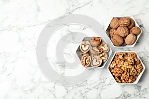 Flat lay composition with walnuts and space for text