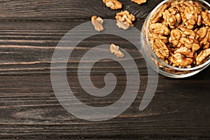 Flat lay composition with walnuts and space for text