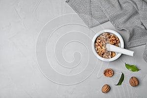 Flat lay composition with walnuts and space for text