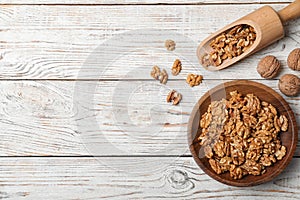 Flat lay composition with walnuts and space for text