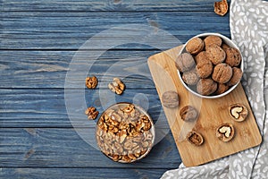 Flat lay composition with walnuts and space for text