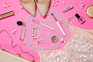 Flat lay composition with women`s accessories, stylish shoes and dress on pink background