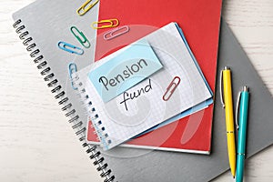 Flat lay composition with words PENSION FUND