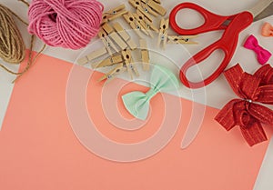 Flat lay craft tools on white desk with copy space